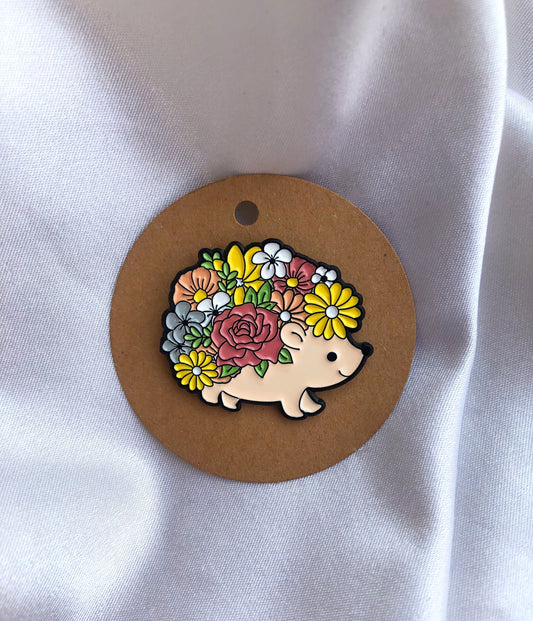 Pin metálico de erizo floral